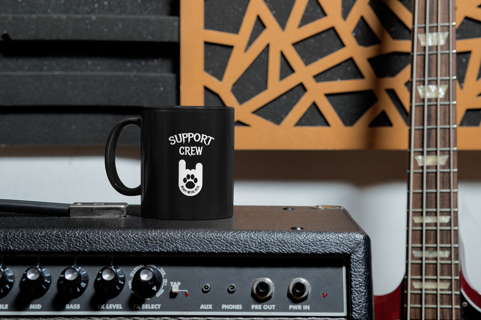 mockup-of-an-11-oz-coffee-mug-placed-next-to-a-bass-guitar-33331.png